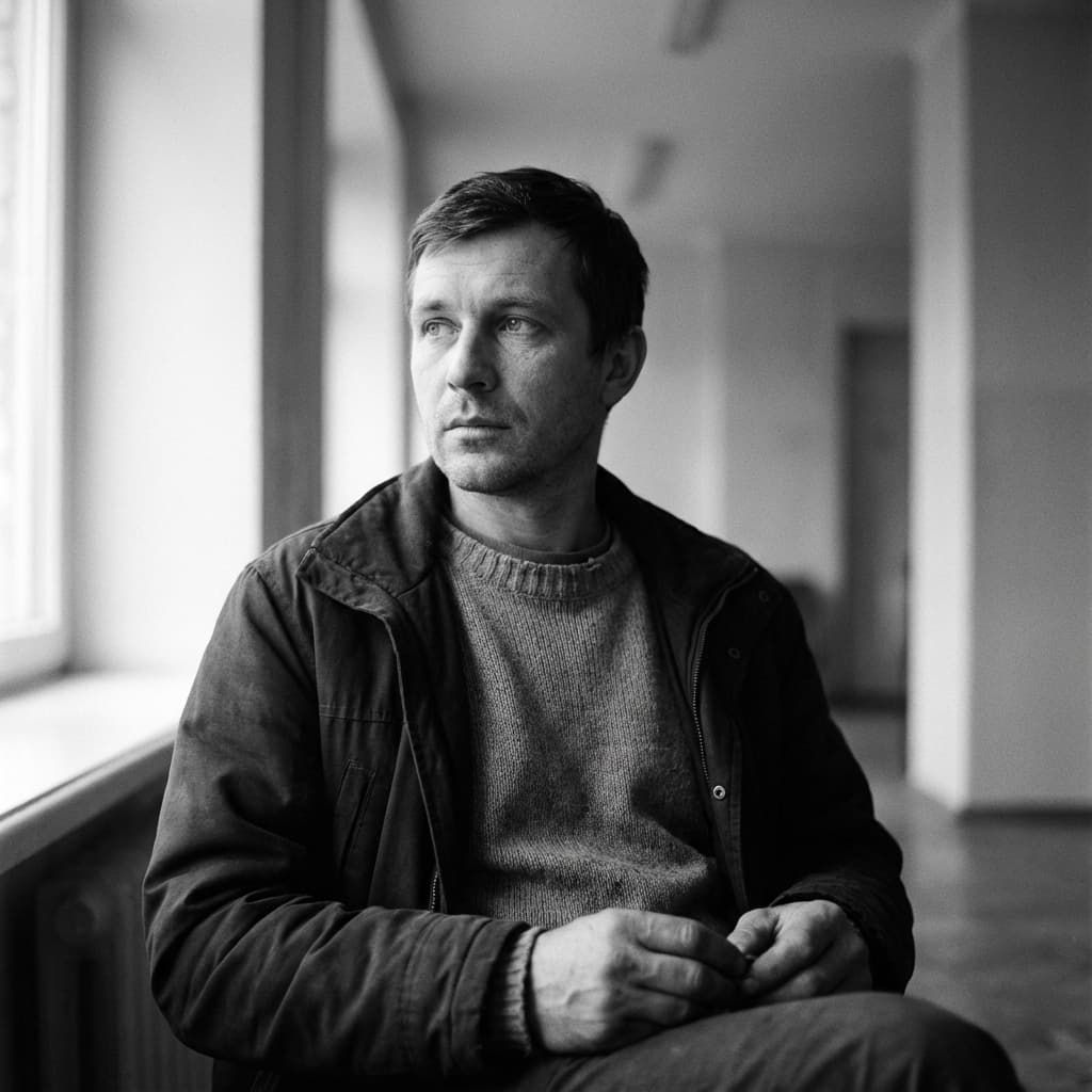 Barter member portrait: Urban professional looking contemplative